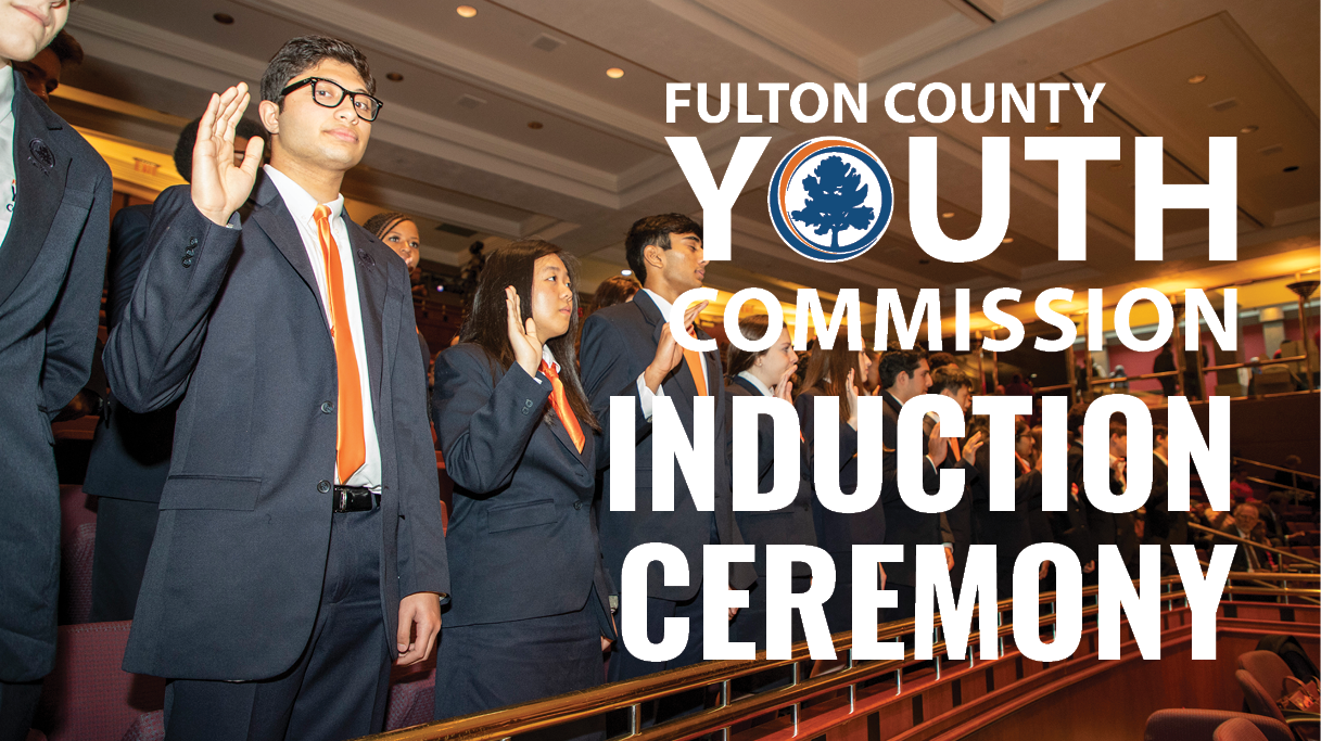 youth induction ceremony text with student raising hand