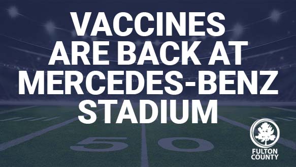 football field in background - vaccines are back at mercedes-benz stadium